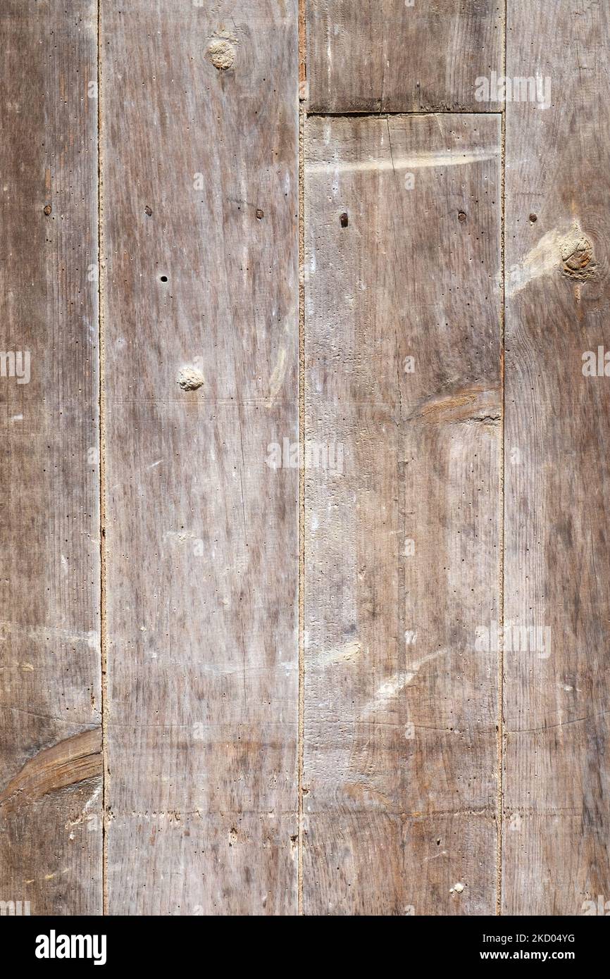 Old wooden exterior door full frame background texture Stock Photo