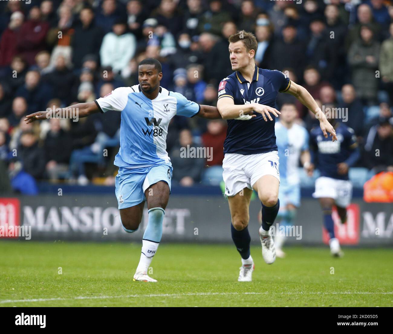 LR VCrystal Palace's Tyrick Mitchell and Matt Smith of Millwall during