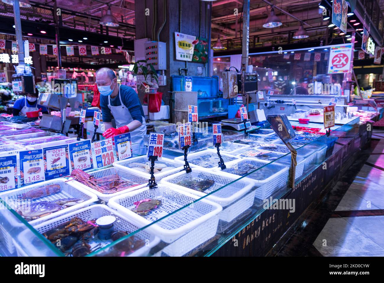 A stall selling live fish and seafood in a wet market at Kai Yip estate