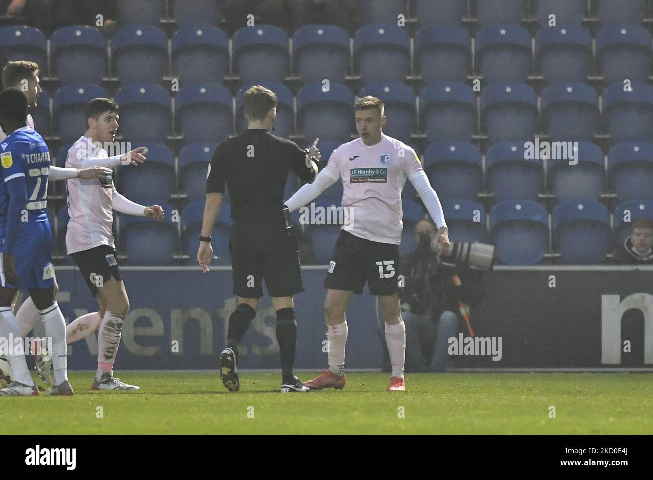 Tom White of Barrow in discussion with the referee Will Finnie during the Sky Bet League 2 match between Colchester United and Barrow at the JobServe Community Stadium, Colchester on Saturday 15th January 2022. (Photo by Ivan Yordanov/MI News/NurPhoto) Stock Photo