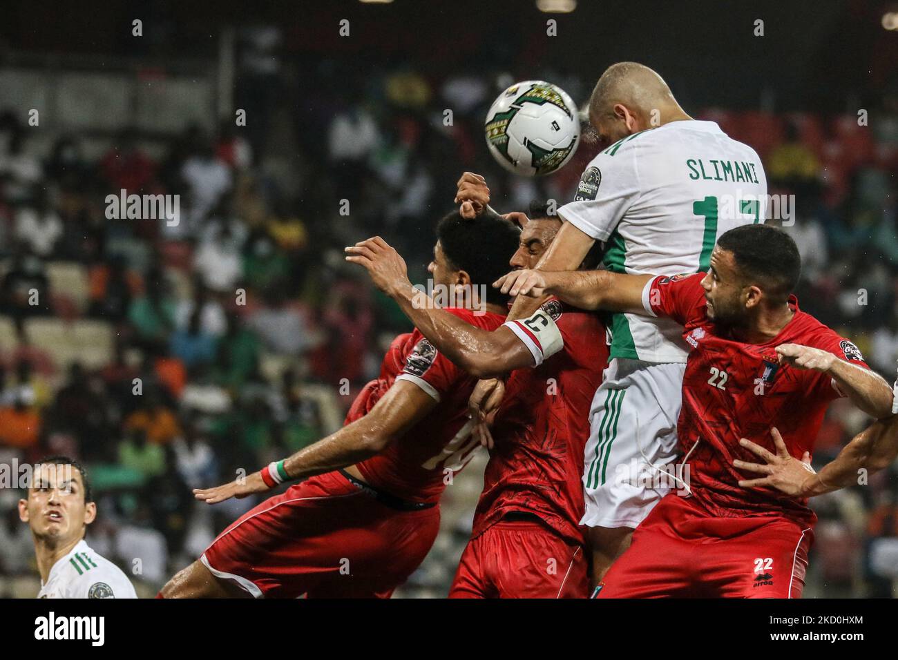 (13) Islam Slimani of Algeria team trying to score during the Group E Africa Cup of Nations (CAN) 2021 football match between Algeria and Equatorial Guinea at Stade de Japoma in Douala on January 16, 2022. (Photo by Ayman Aref/NurPhoto) Stock Photo