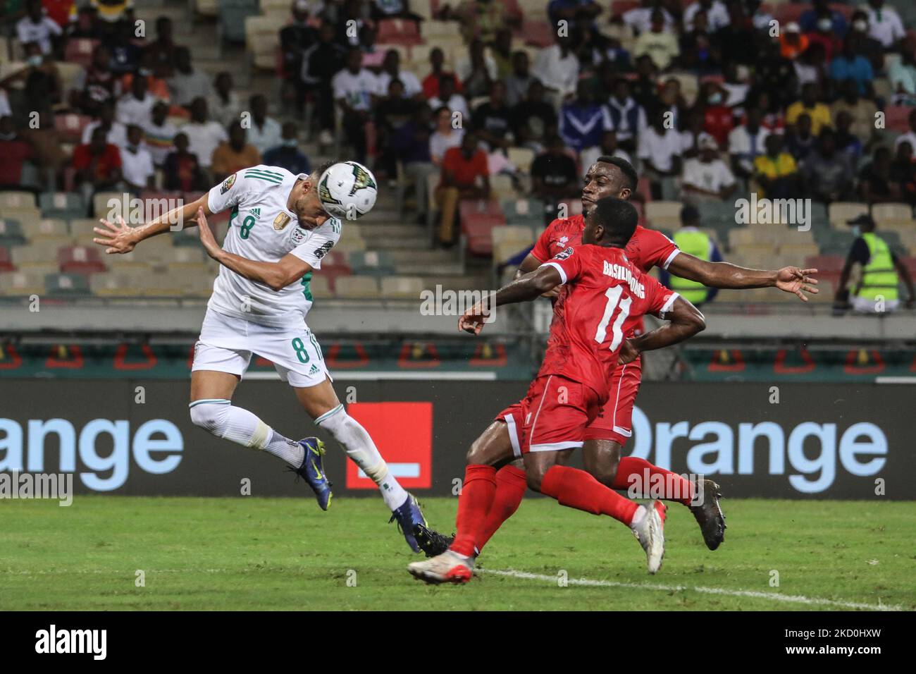 (8) Youcef BelaÃ¯li of team Algeria pass the ball through Equatorial Guinea players during the Group E Africa Cup of Nations (CAN) 2021 football match between Algeria and Equatorial Guinea at Stade de Japoma in Douala on January 16, 2022. (Photo by Ayman Aref/NurPhoto) Stock Photo