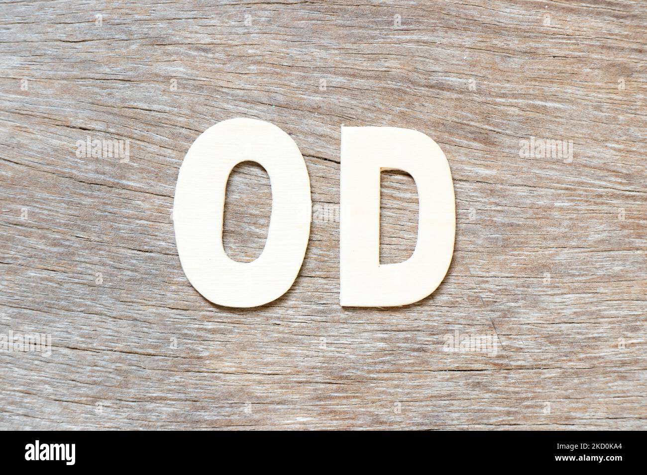 Alphabet letter in word OD (Abbreviation of overdraft) on wood ...