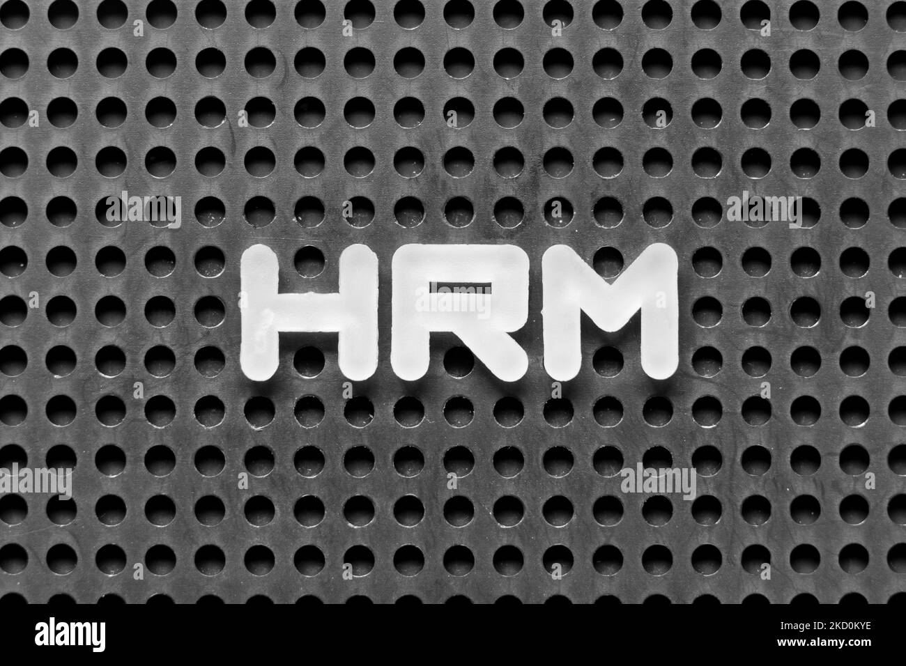 White alphabet letter in word HRM (Abbreviation of human resource