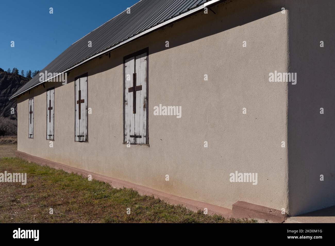 Crosses on window shutters of the adobe St. James the Apostle Mission in Trujillo, Colorado, United States. Stock Photo