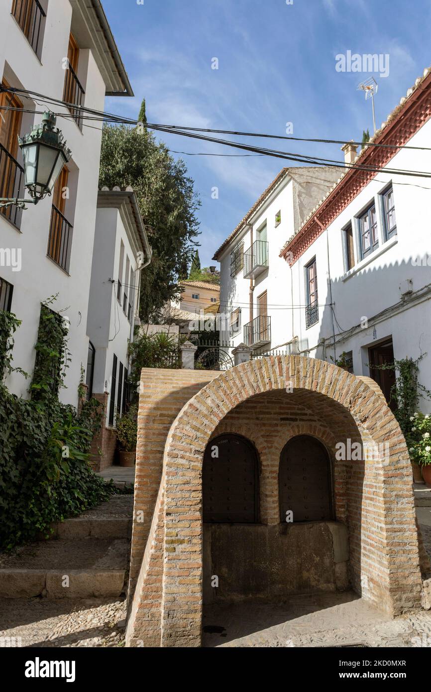 Granada, Spain October 28, 2022 Narrow street in Granada, Spain on