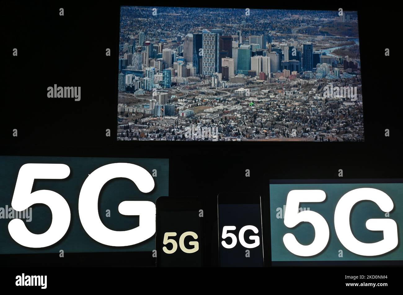 Images of the 5G sign displayed on the screens of mobile phones and