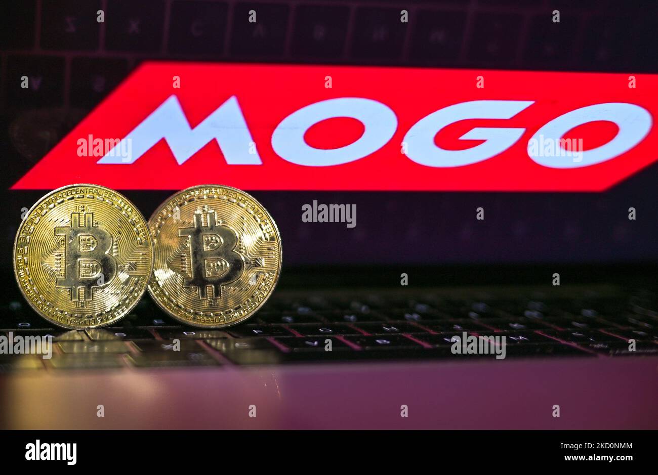 Illustrative image of two commemorative bitcoins with the MOGO logo seen in the background. On Wednesday, January 19, 2021, in Edmonton, Alberta, Canada. (Photo by Artur Widak/NurPhoto) Stock Photo