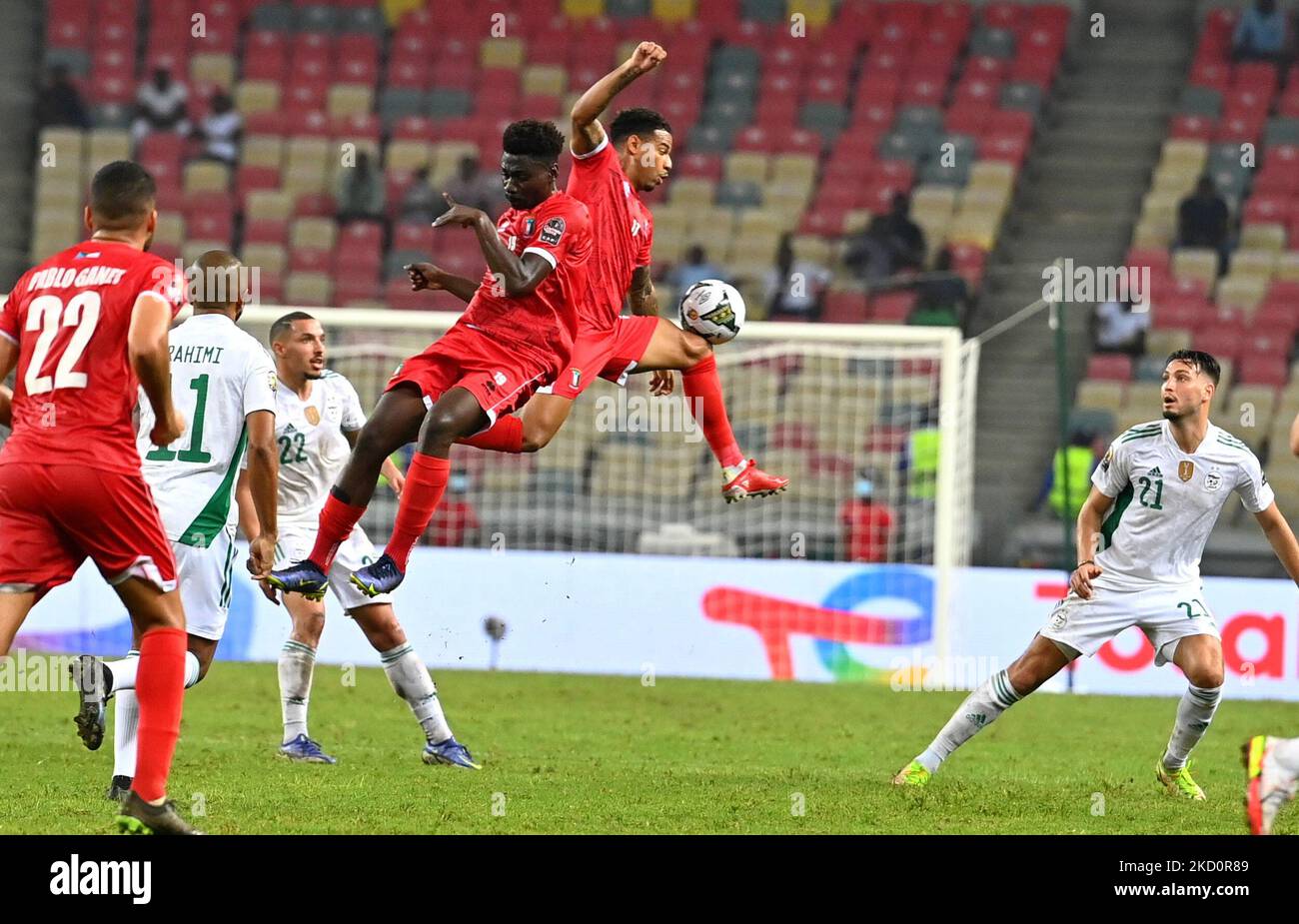 Equatorial Guinea player Ndong (C) fights for the ball, during the 2021 Africa Cup of Nations (CAN) Group E football match between Algeria and Equatorial Guinea at Japoma Stadium in Douala on 16 January 2022 (Photo by APP/NurPhoto) Stock Photo