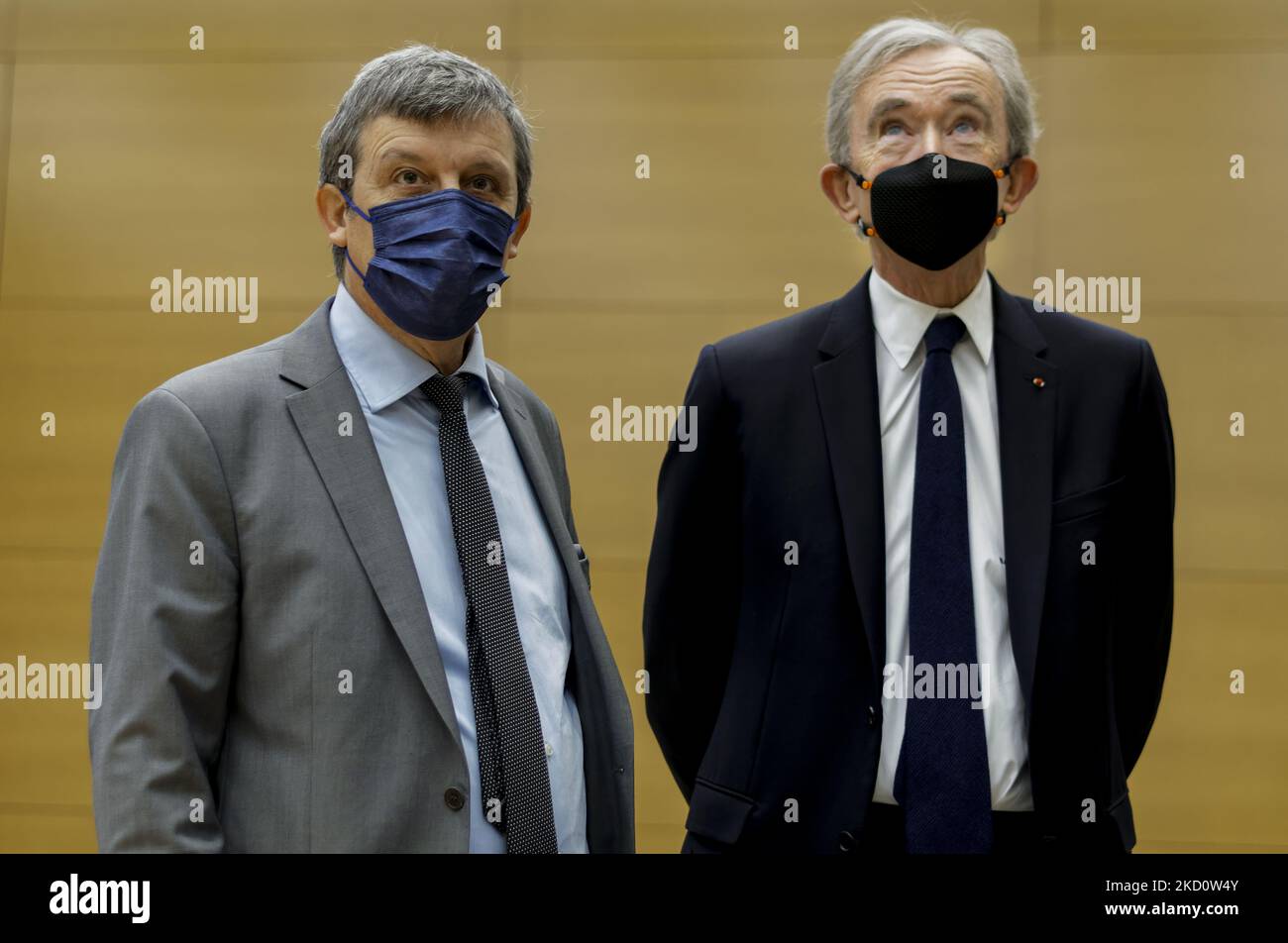 From L) Chairman and CEO of LVMH Bernard Arnault, Hong Kong actress Maggie  Cheung and Dior CEO Sidney Toledano are seen during the opening ceremony o  Stock Photo - Alamy
