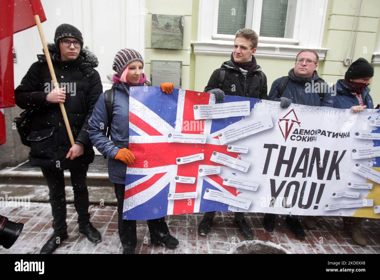 Ukrainians hold a banner as they take part at a rally to thank Great Britain for supplying Ukraine with weapons, outside the British Embassy in Kyiv, Ukraine on 21 January 2022. The next consignment of the international technical aid from the Great Britain to the Ukraine's armed forces has been delivered. The partners provided new light anti-tank launchers, a website of the Ministry of Defence of Ukraine informed on 18 January 2022. (Photo by STR/NurPhoto) Stock Photo