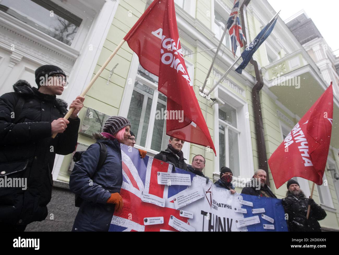Ukrainians hold a banner as they take part at a rally to thank Great Britain for supplying Ukraine with weapons, outside the British Embassy in Kyiv, Ukraine on 21 January 2022. The next consignment of the international technical aid from the Great Britain to the Ukraine's armed forces has been delivered. The partners provided new light anti-tank launchers, a website of the Ministry of Defence of Ukraine informed on 18 January 2022. (Photo by STR/NurPhoto) Stock Photo