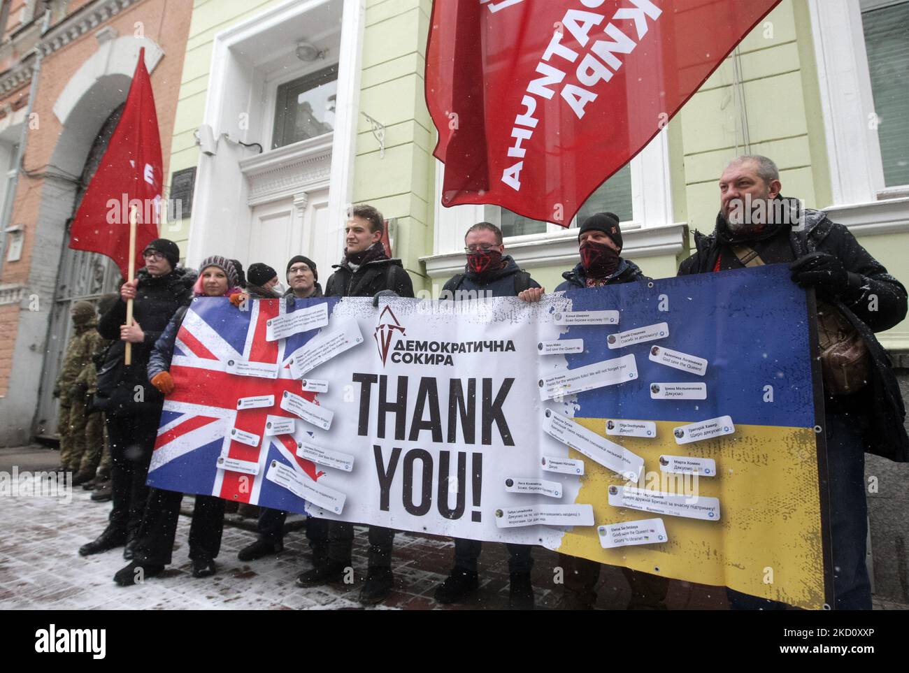 Ukrainians hold a banner as they take part at a rally to thank Great Britain for supplying Ukraine with weapons, outside the British Embassy in Kyiv, Ukraine on 21 January 2022. The next consignment of the international technical aid from the Great Britain to the Ukraine's armed forces has been delivered. The partners provided new light anti-tank launchers, a website of the Ministry of Defence of Ukraine informed on 18 January 2022. (Photo by STR/NurPhoto) Stock Photo