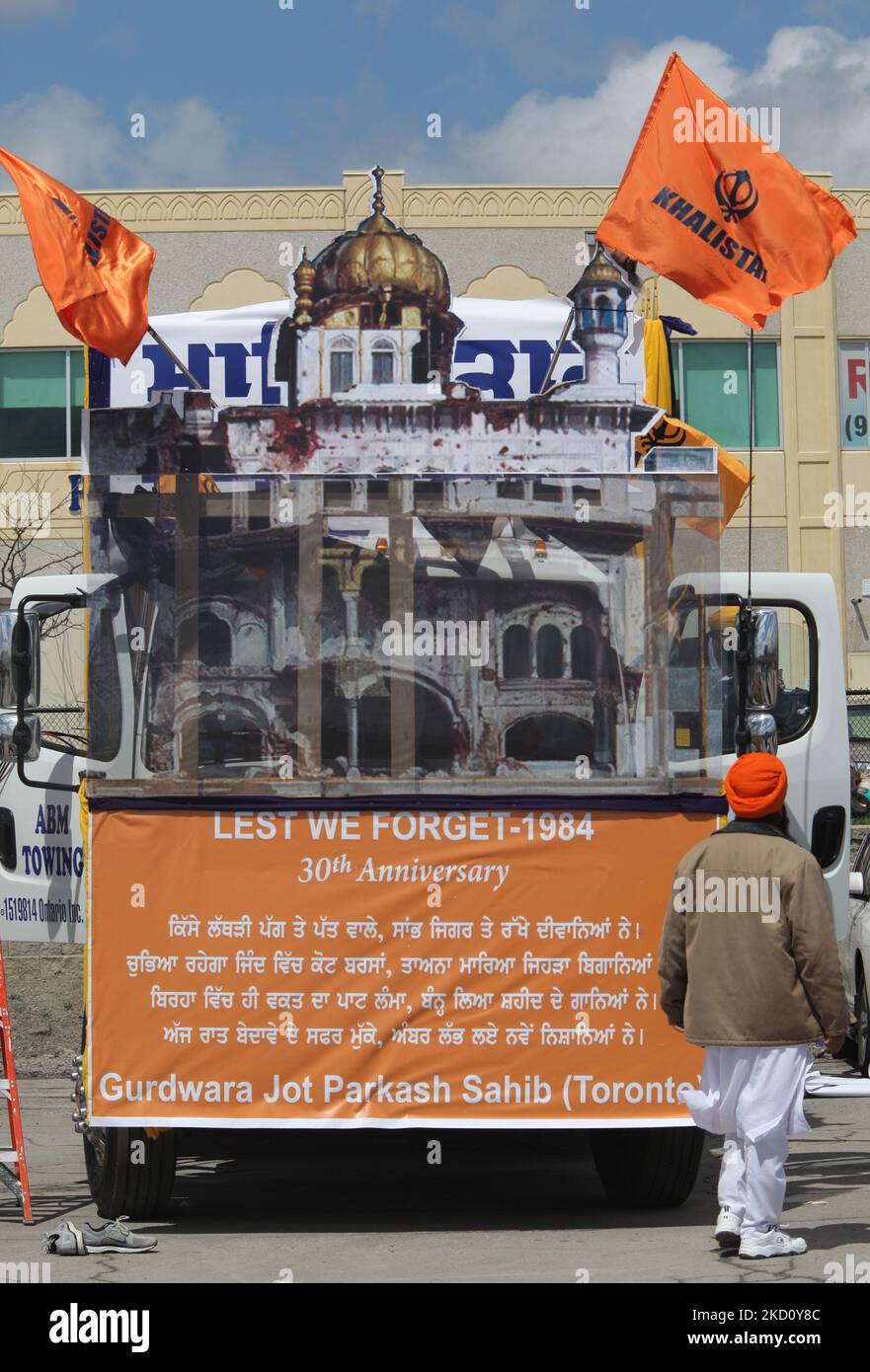 A large truck commemorating the 30th anniversary of the 1984 massacre with the image of Jarnail Singh Bhindranwale (a controversial figure in Indian history whom the Sikhs consider to be a great martyr and is regarded by others as a militant figure).There are other images of Sikh martyrs along with descriptions to commemorate the 1984 storming of the Golden Temple by the Indian army and to pay homage to the thousands of Sikhs who were killed in an apparent revenge attack instigated by members of the ruling Congress party and sparked by the assassination of the Indian Prime Minister Indira Gand Stock Photo