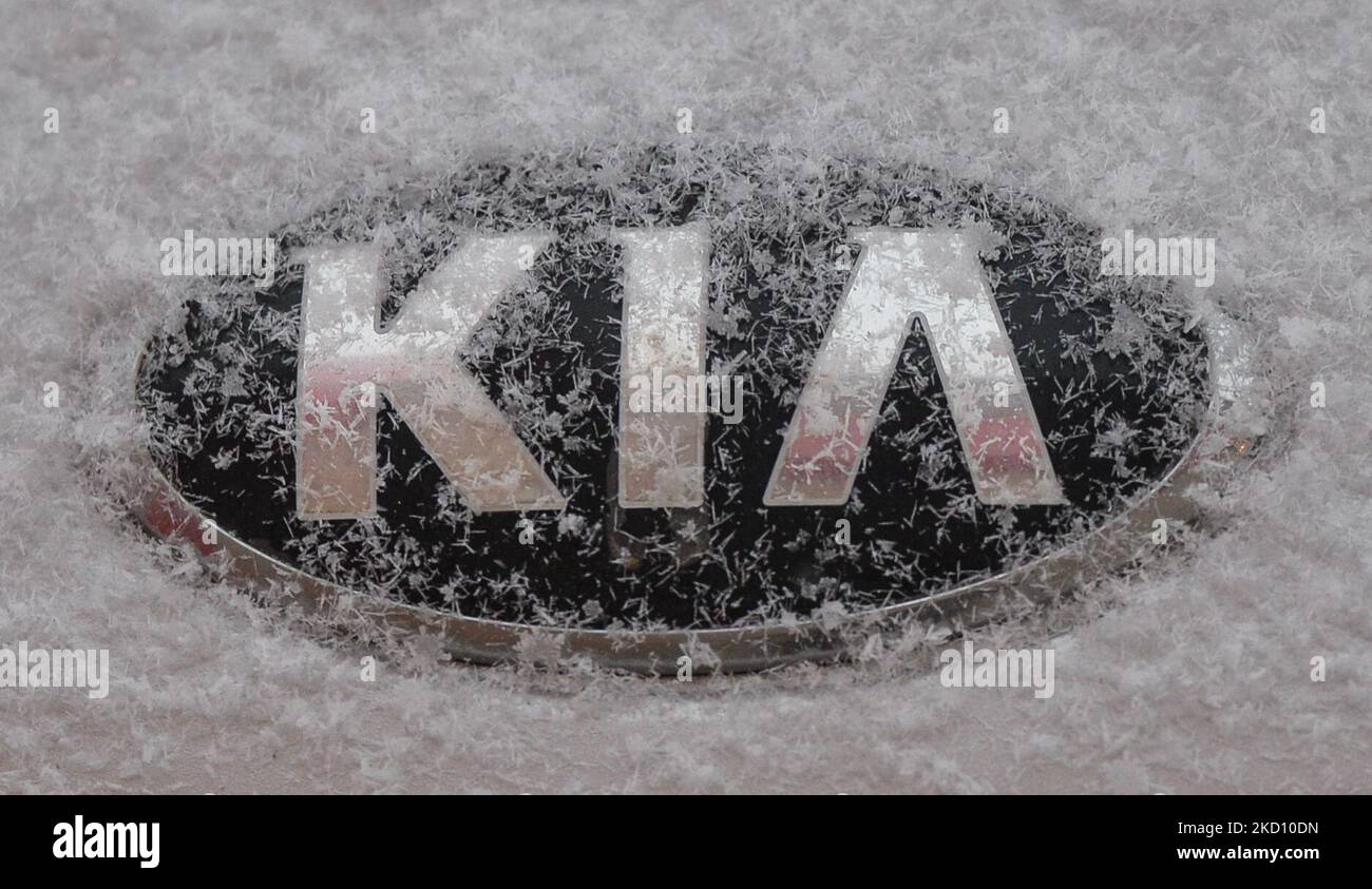 KIA logo seen on a Kia car covered with snow. On Friday, January 21, 2022, in Edmonton, Alberta, Canada. (Photo by Artur Widak/NurPhoto) Stock Photo
