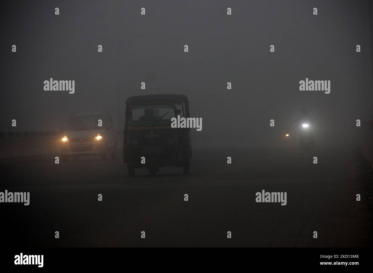 Fog enveloped into the Bhubaneswar city as commuters, street vendors, railway track workers are seen on their daily routine works in the foggy morning in the eastern Indian state Odisha's capital city Bhubaneswar (Photo by STR/NurPhoto) Stock Photo