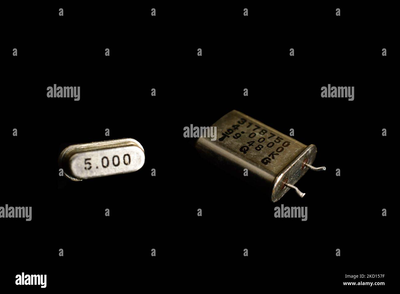 Different types of quartz resonators. Isolated on black background
