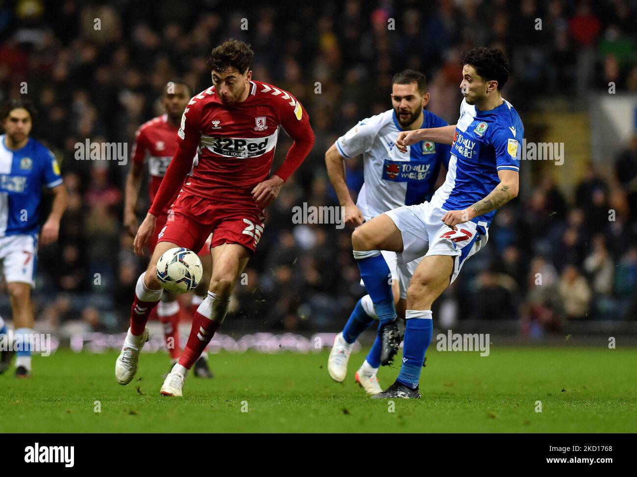 Matt Crooks of Middlesbrough Football Club tussles with Lewis Travis of Blackburn Rovers during the Sky Bet Championship match between Blackburn Rovers and Middlesbrough at Ewood Park, Blackburn on Monday 24th January 2022. (Photo by Eddie Garvey/MI News/NurPhoto) Stock Photo