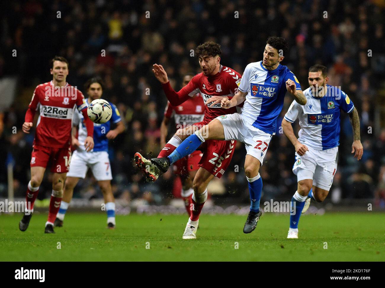 Matt Crooks of Middlesbrough Football Club tussles with Lewis Travis of Blackburn Rovers during the Sky Bet Championship match between Blackburn Rovers and Middlesbrough at Ewood Park, Blackburn on Monday 24th January 2022. (Photo by Eddie Garvey/MI News/NurPhoto) Stock Photo