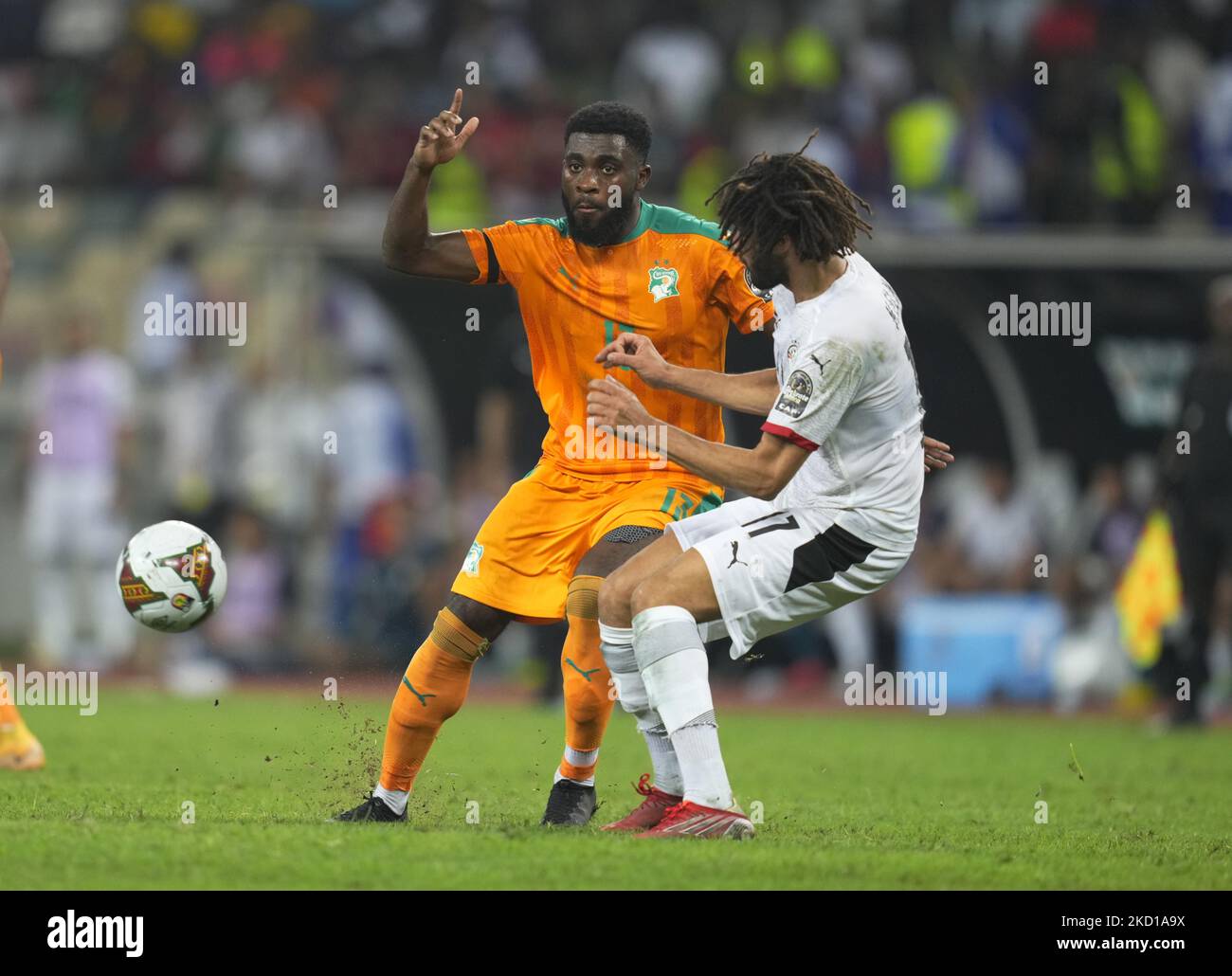 Prague, Czech Republic. 14th Apr, 2019. L-R Simon Deli (Slavia) and  Benjamin Tetteh (Sparta) are seen during the Czech first soccer league  (Fortuna Liga), 28th round, match SK Slavia Praha vs AC