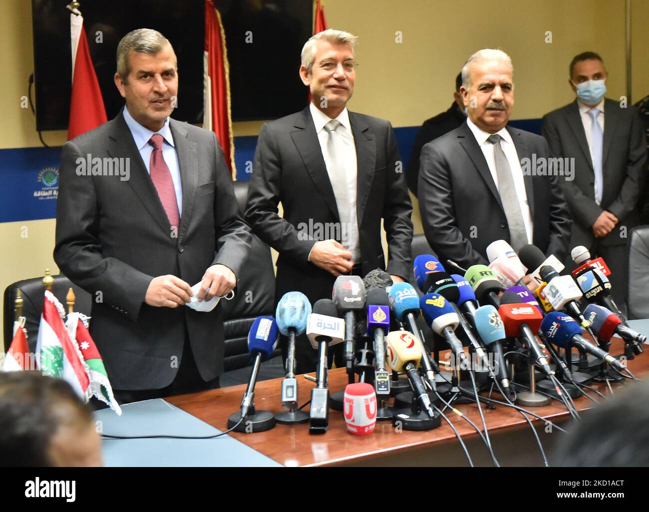 Lebanon's Energy Minister Walid Fayad (R), Syria's Electricity Minister Ghassan al-Zamil (2nd R) and Jordan's Minister of Energy and Mineral Resources Saleh Ali Hamed al-Kharabsheh (L) sit during the signing of a deal that will supply Lebanon with electricity, in Beirut on January 26, 2022. (Photo by Fadel Itani/NurPhoto) Stock Photo