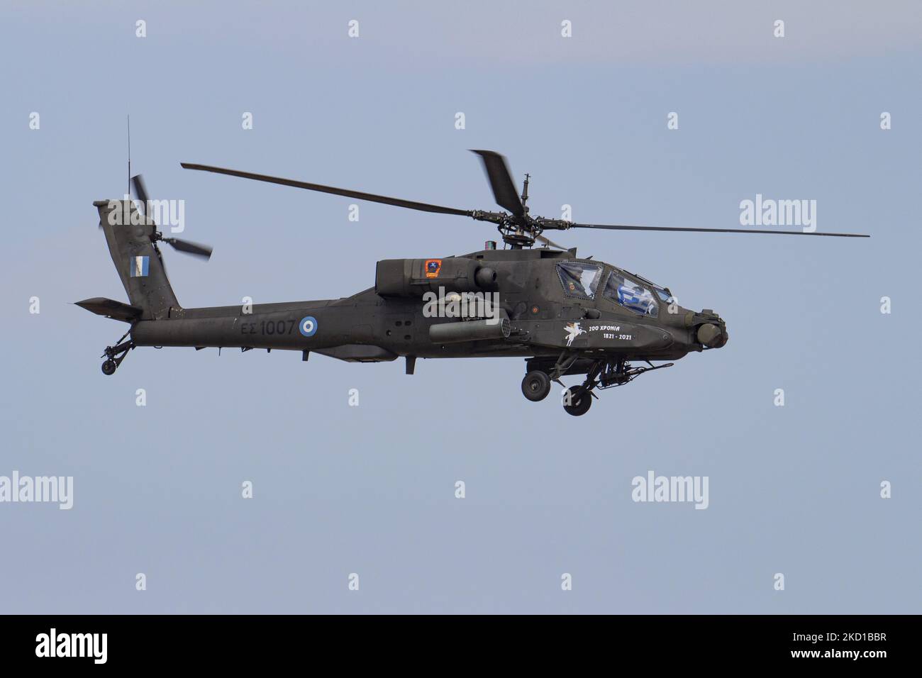 A Boeing AH-64 Apache helicopter from the Greek Army as seen flying and manoeuvering during a flying display demonstration during Athens Flying Week 2021 Air Show at Tanagra Air Base Airport. The Apache of the Hellenic military is the AH-64D Apache Longbow version. The specific aircraft is a twin turboshaft attack combat helicopter under the fuselage and on the wings with a machine gun, missiles, rocket and self defense capabilities. Greece, a country with strong air force is a member state of the North Atlantic Treaty Organization NATO. Tanagra, Greece on September 5, 2021 (Photo by Nicolas E Stock Photo