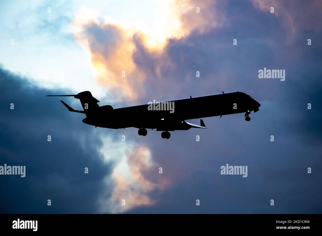 Silhouette, a symbol photo, illustration of an airplane flying in the ...