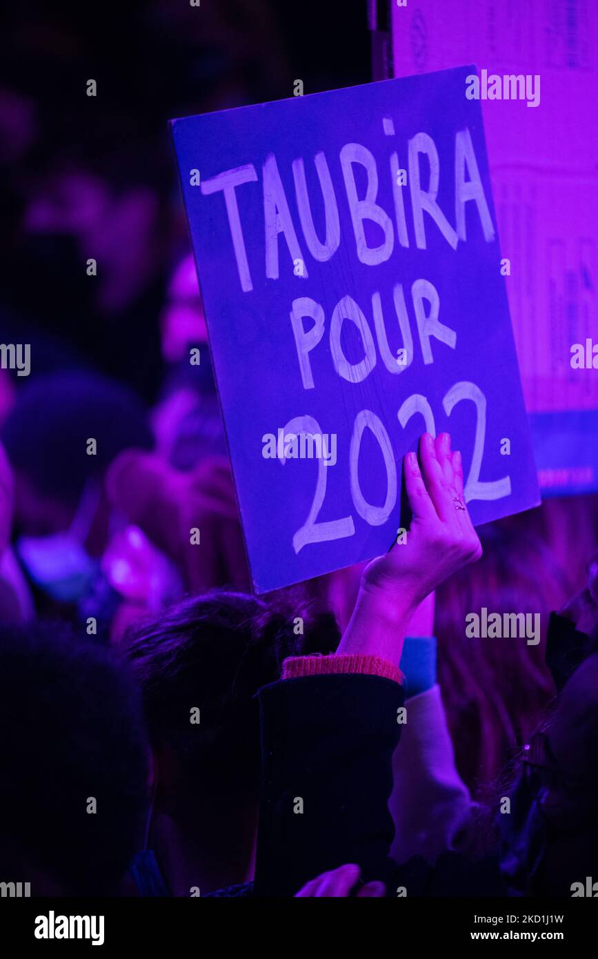 Signs with portraits and slogans in support of Taubira are held up as French left-wing 'popular primary' candidate Christiane Taubira delivers a speech to supporters gathered at Point Ephemere in Paris on Jan. 30, 2022 after the announcement of the results of the 'popular primary' that saw her finish first and thus be a candidate in the presidential election. (Photo by Samuel Boivin/NurPhoto) Stock Photo