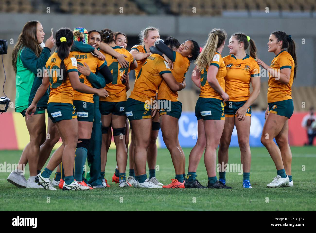 Players of Australian celebrate winning during the Women's HSBC World