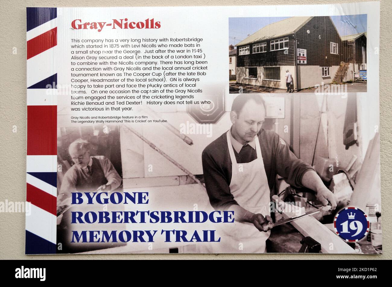 The Bygone Robertsbridge Memory Trail information panel outside the Grays-Nicholls factory. The company is world famous for making cricket bats. Stock Photo