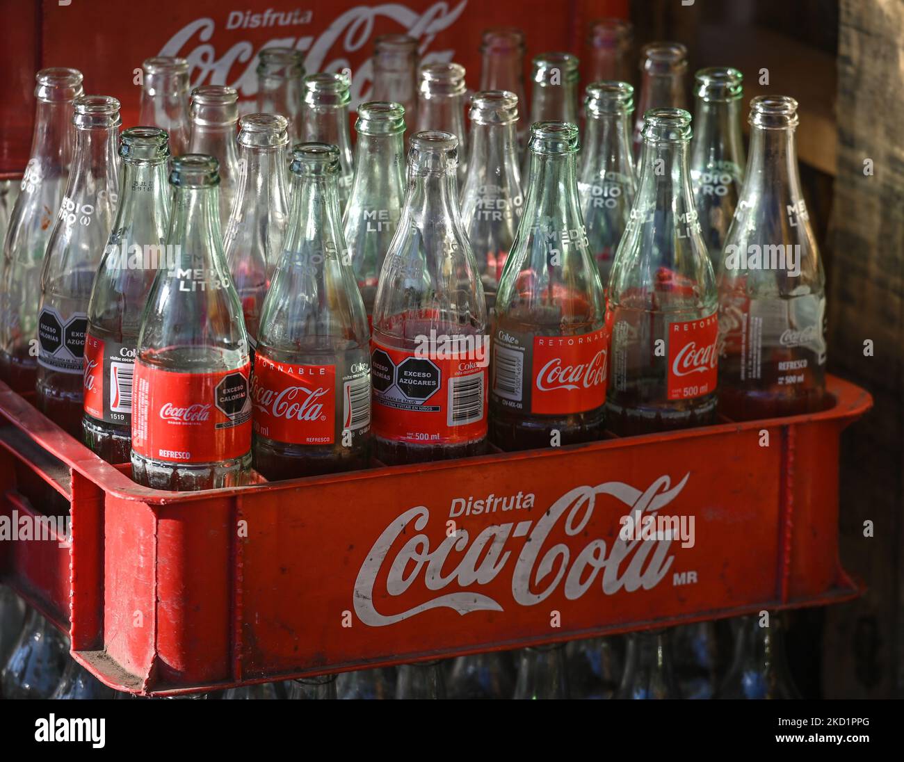Empty CocaCola bottles at a street stand in San Juan Chamula. On