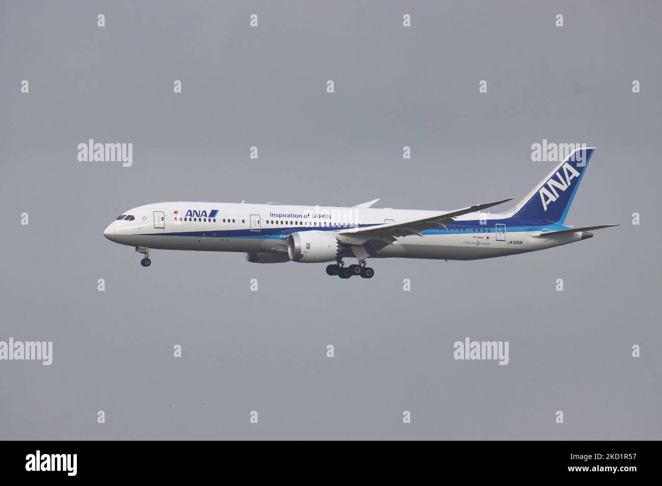 ANA All Nippon Airways Boeing 787 Dreamliner aircraft as seen on final approach flying, doing a go around and then landing at Brussels Airport Zaventem BRU. The arriving from Tokyo passenger plane, a Boeing B787-9 wide body airplane of ANA Air Japan has the registration JA932A. The Japanese airline is member of Star Alliance aviation group with a fleet of 214 jet planes. The aviation industry and passenger traffic are phasing a difficult period with the Covid-19 coronavirus pandemic having a negative impact on the travel business industry with fears of the worsening situation due to the new Om Stock Photo