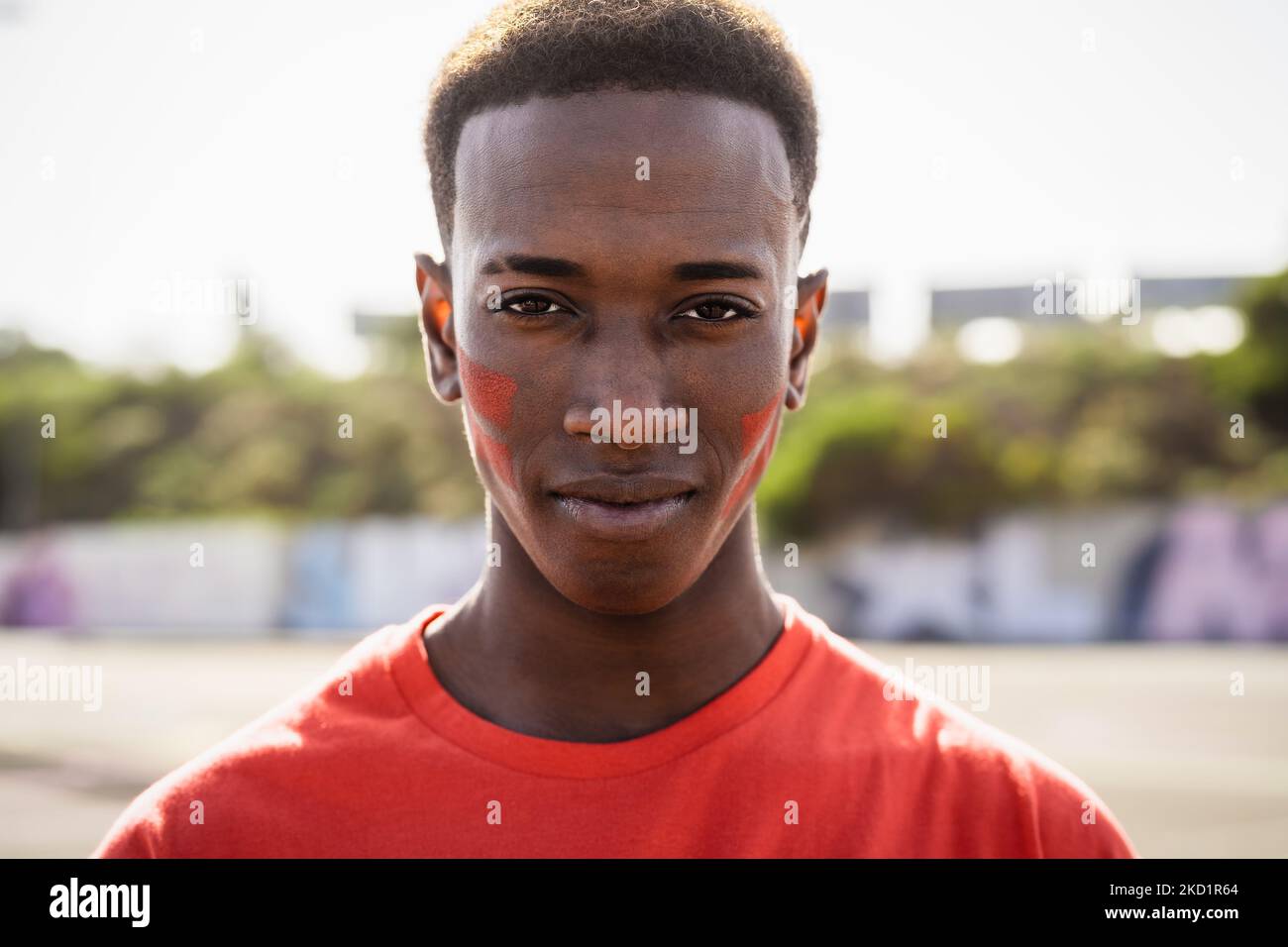 African football fan supporting his favorite team - Sport entertainment concept Stock Photo