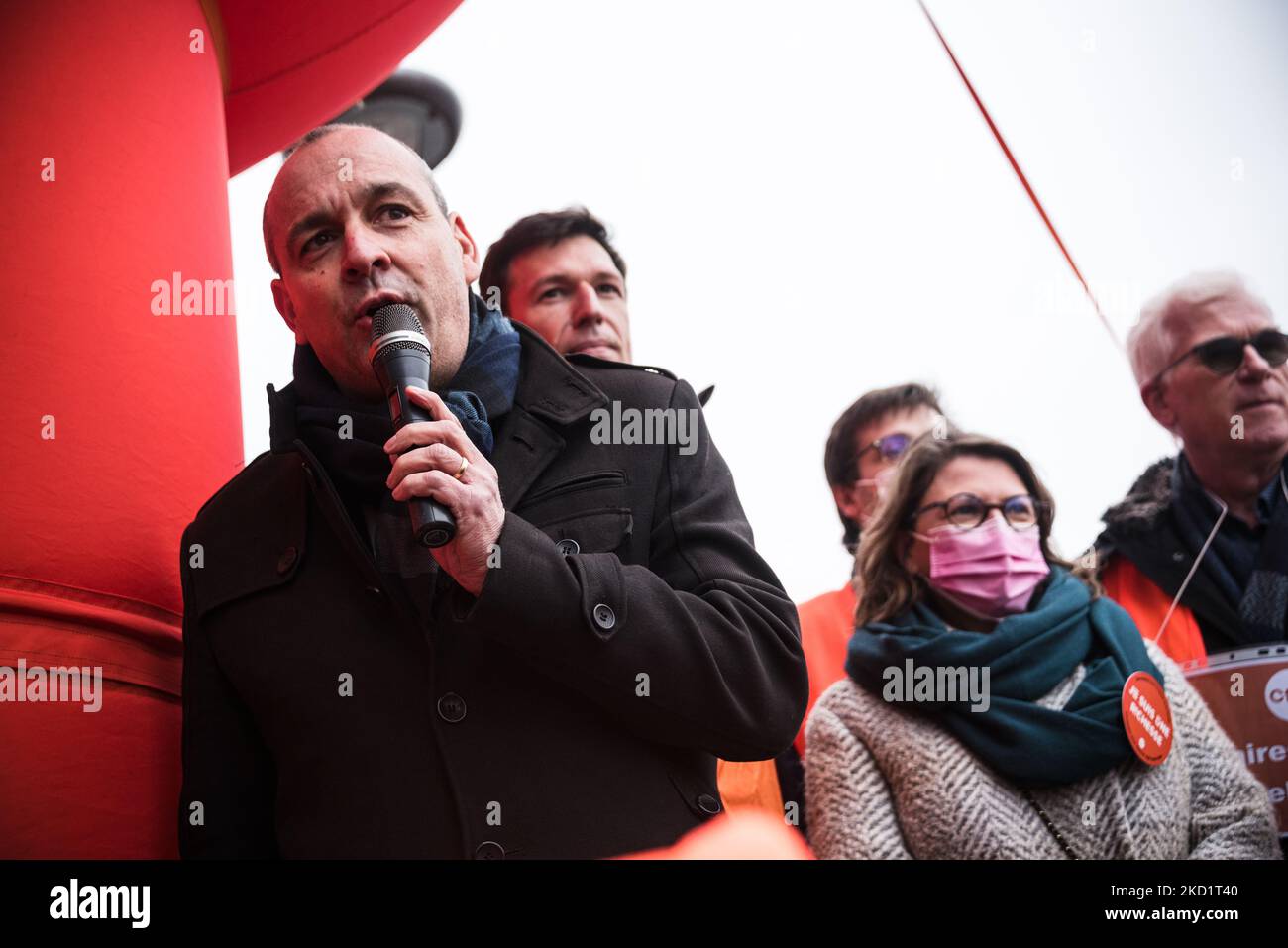 CFDT Secretary General Laurent Berger (Center) delivers a speech as several hundred CFDT (Confédération Française Des Travailleurs) union activists gathered in Paris in front of the Beaugrenelle shopping center on February 3, 2022 to participate in the March of Non-Essential Workers organized by the union to demand better wages and working conditions for those on the front lines during the COVID pandemic. (Photo by Samuel Boivin/NurPhoto) Stock Photo