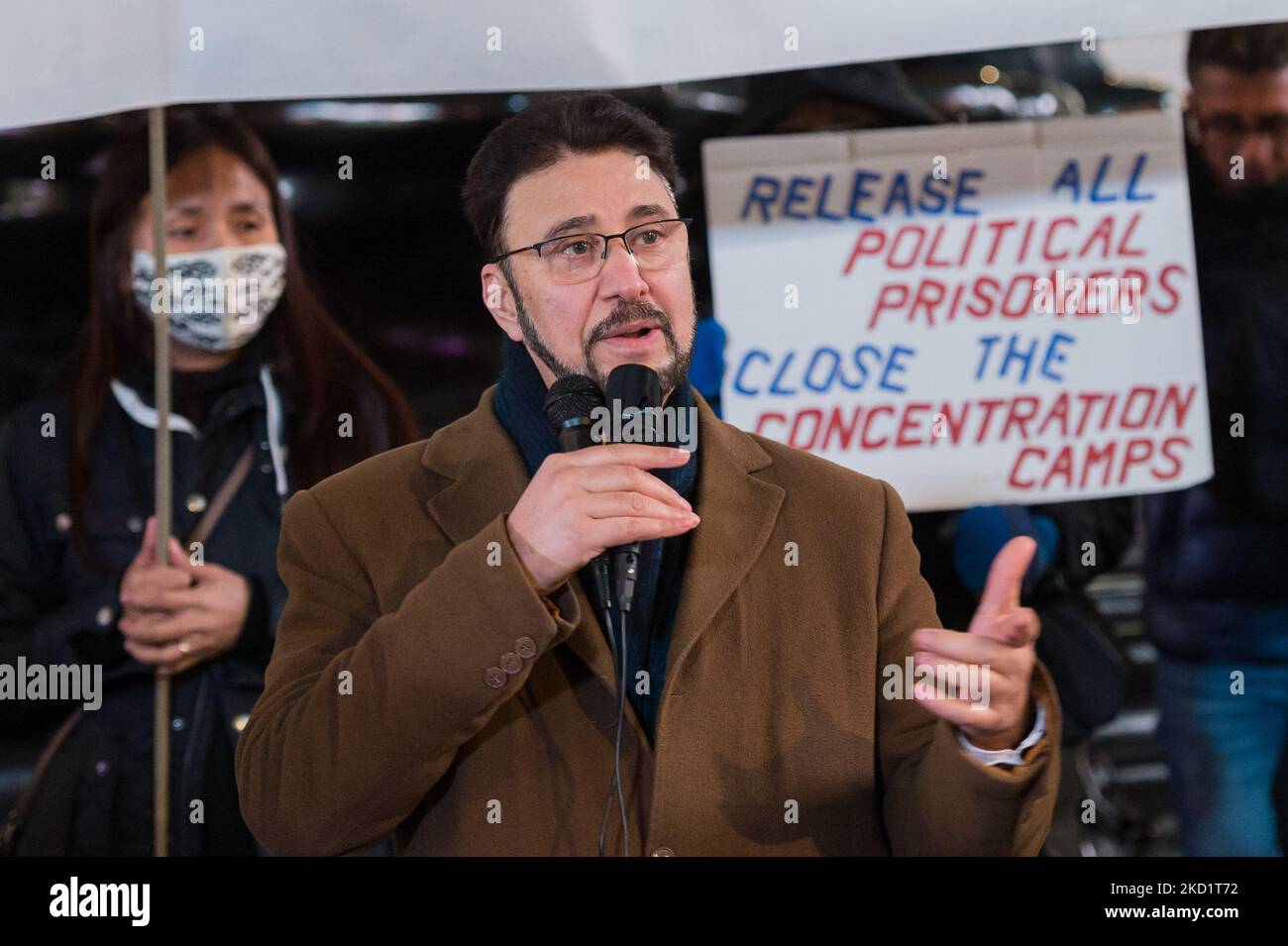 LONDON, UNITED KINGDOM - FEBRUARY 03, 2022: Labour Party MP Afzal Khan addresses Hongkongers, Tibetans, Uyghur Muslims, their Tigrayan allies and supporters during a protest in Piccadilly Circus on the eve of Beijing 2022 Winter Olympic Games on February 03, 2022 in London, England. The demonstrators protest against the International Olympics Committee's (IOC) decision to award this year's Winter Olympics to China amid the country's record of human rights violations in Hongkong and Tibet as well as crimes against humanity against Uyghurs and other Turkic Muslims in the northwestern region of X Stock Photo