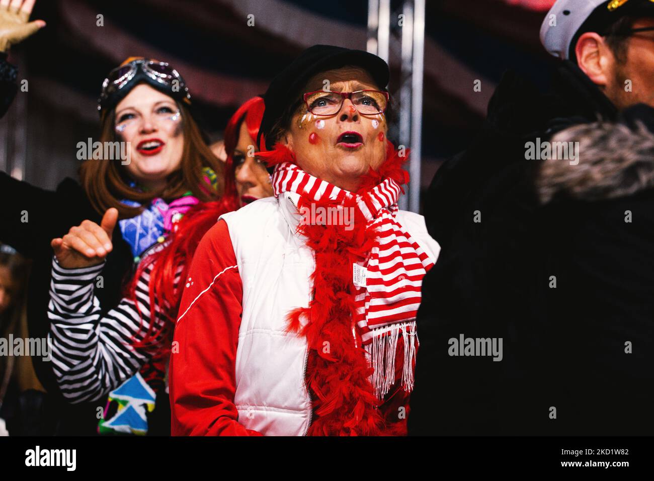 A concert goer sings during the carnival concert held in Cologne, Germany on Feb 4, 2022 as Omicron waves hits new record in Germany (Photo by Ying Tang/NurPhoto) Stock Photo