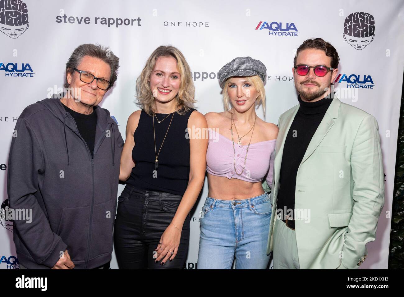 Hollywood, USA. 04th Nov, 2022. Scott Page, Nika Khitrova, Erin Gavin, Tommy Smith attend Rock Photographer Steve Rapport Photo Exhibition VIP Reception at Musichead Gallery, Hollywood, CA, November 4th 2022 Credit: Eugene Powers/Alamy Live News Stock Photo