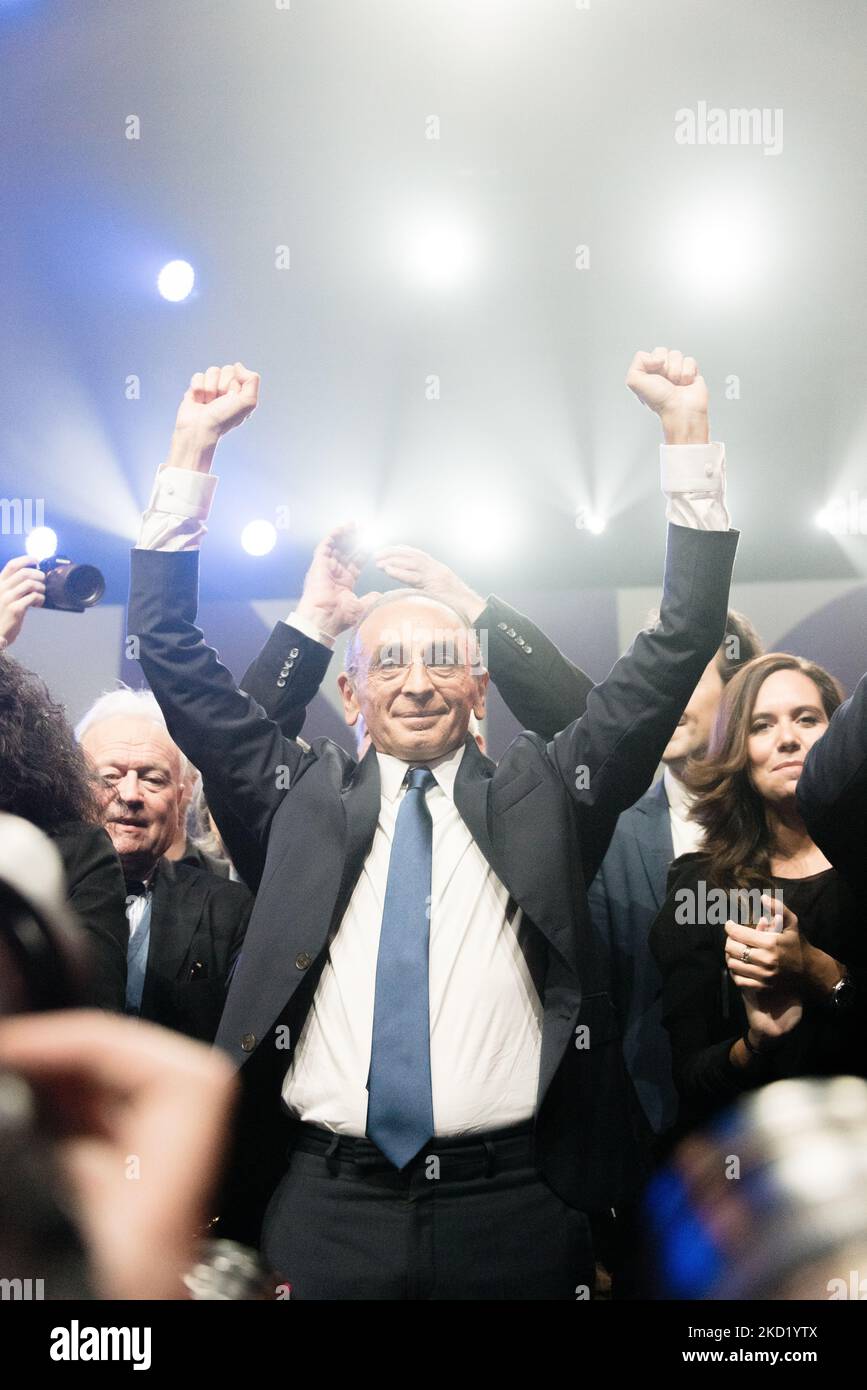 French presidential candidate for the far-right Reconquete! party Eric Zemmour raises his arms in the air at the end of his rally surrounded by all his main supporters after a speech to several thousand activists during a campaign rally in Lille, northern France, Feb. 5, 2022, ahead of the April 2022 presidential election in France. (Photo by Samuel Boivin/NurPhoto) Stock Photo
