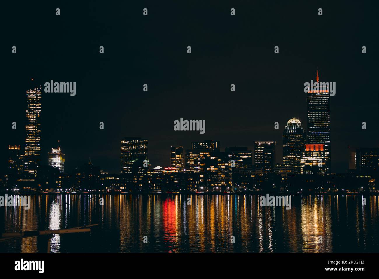 The cityscape of Boston with the Charles river reflecting the city ...
