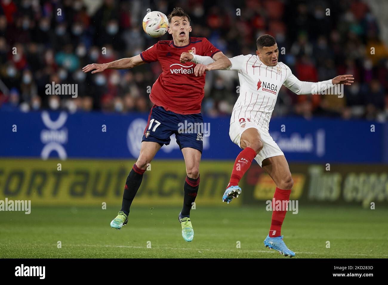 Pamplona, Spain. 11th May, 2021. The referee gives a yellow card to Budimir  during the Spanish La Liga Santander match between CA Osasuna and Cádiz CF  at the Sadar stadium.(Finale Score; CA