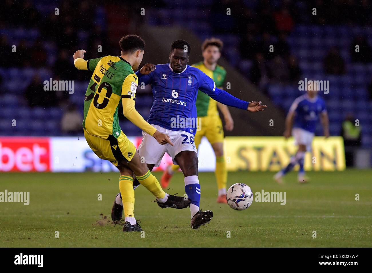 Oldham Athletic's Christopher Missilou tussles with Luca Hoole of Bristol Rovers during the Sky Bet League 2 match between Oldham Athletic and Bristol Rovers at Boundary Park, Oldham on Tuesday 8th February 2022. (Photo by Eddie Garvey/MI News/NurPhoto) Stock Photo