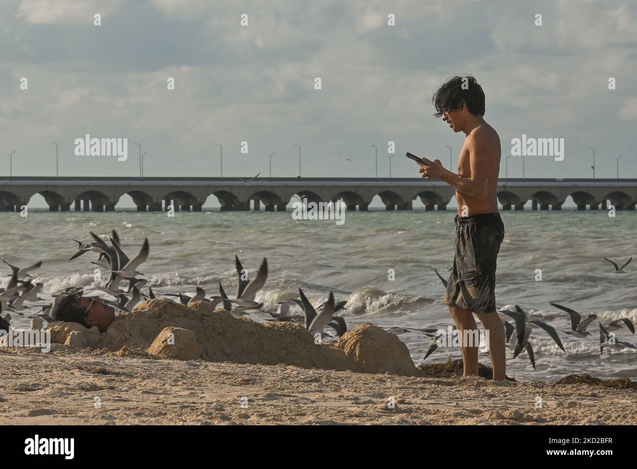 People enjoy the nice weather at the beach in Progreso. On Wednesday
