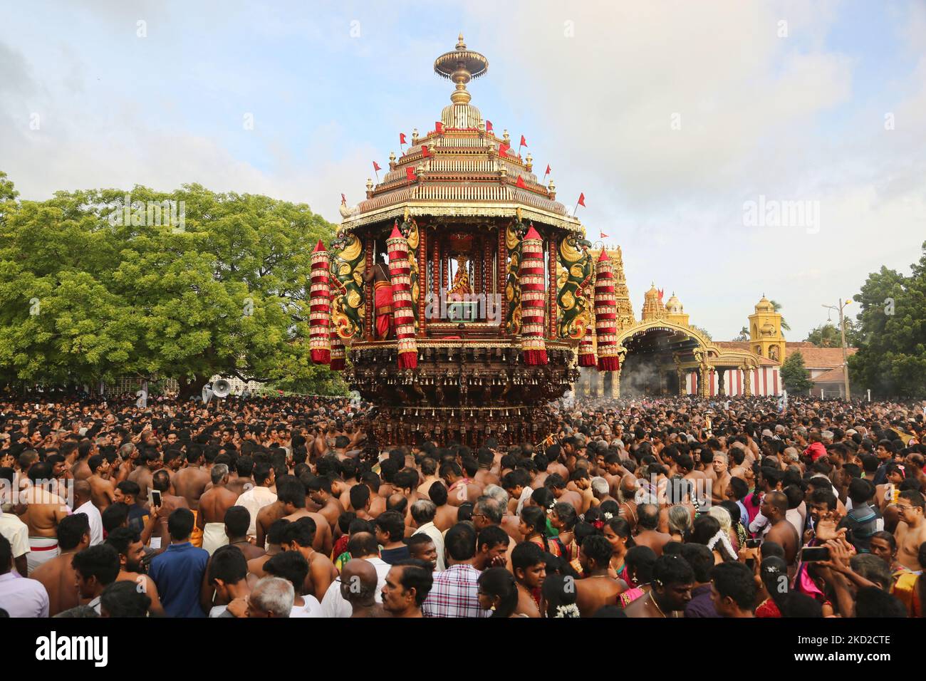 Tamil Hindu devotees escort the large wooden chariot carrying the idol of Lord Murugan during the Ther Festival (Chariot Festival) at the Nallur Kandaswamy Kovil (Nallur Temple) in Jaffna, Sri Lanka, on August 21, 2017. Hundreds of thousands of Tamil Hindu devotees from across the globe attended this festival. (Photo by Creative Touch Imaging Ltd./NurPhoto) Stock Photo