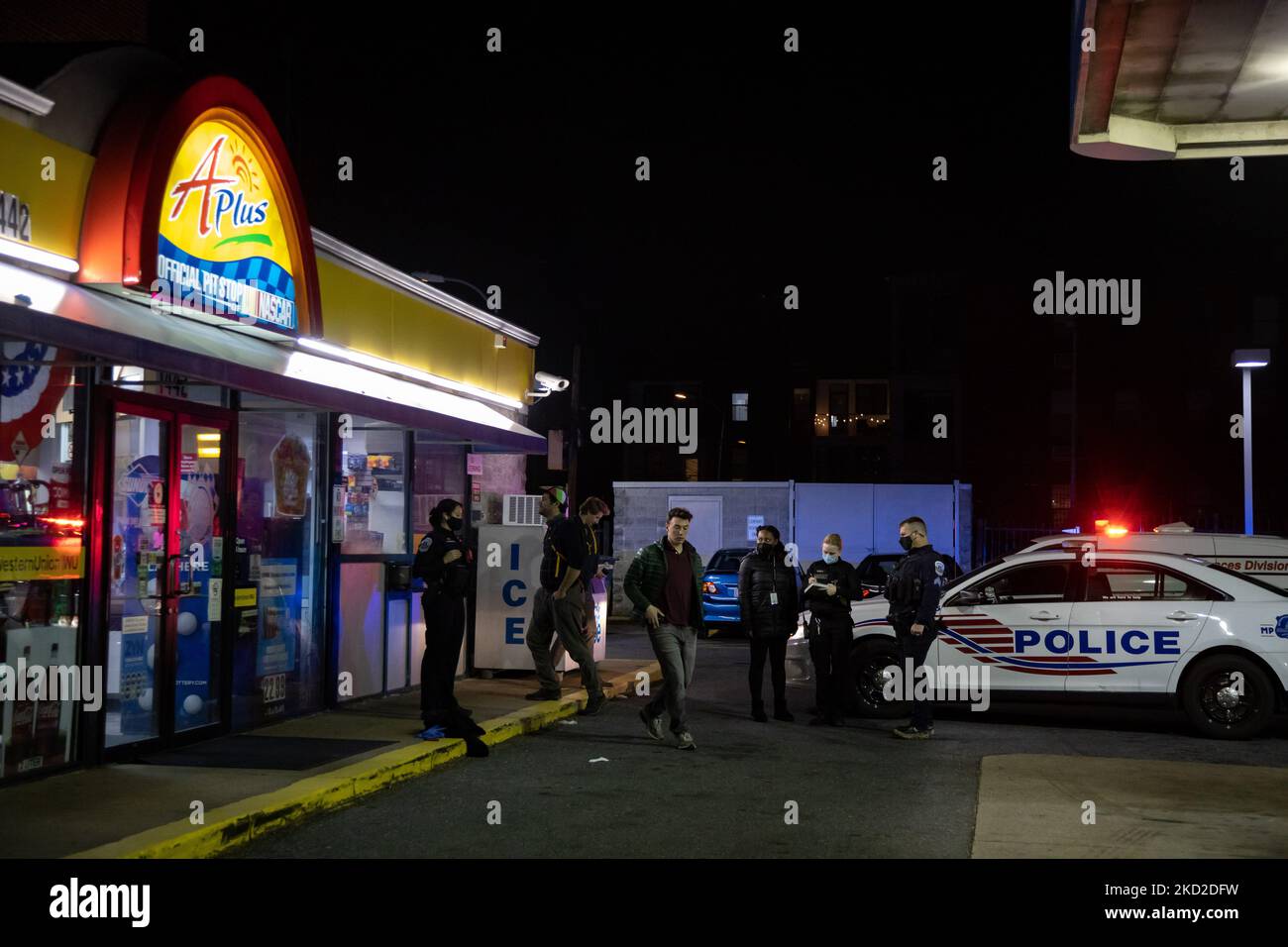 Police respond to a report of a double shooting at a gas station at