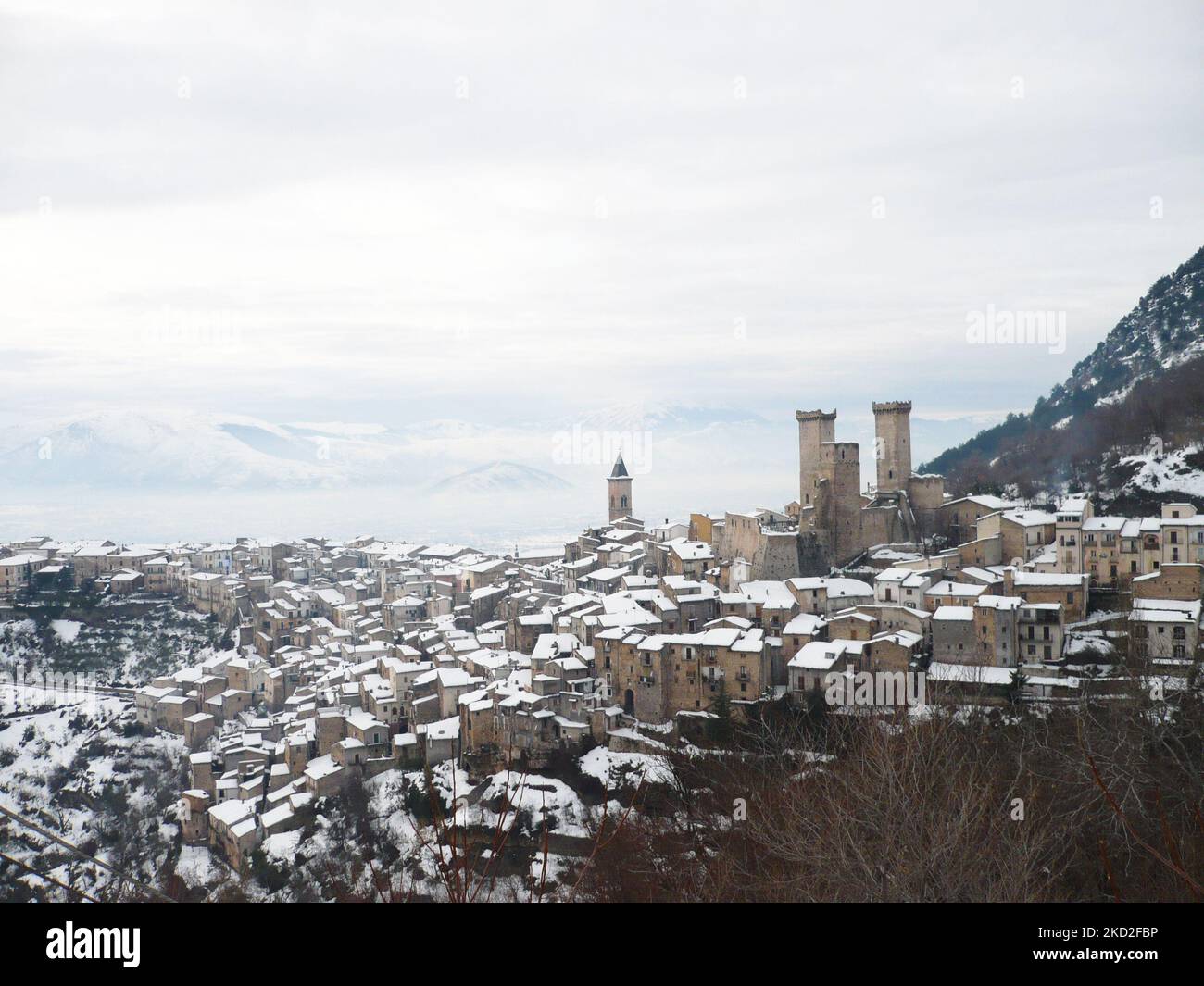 Snowy view of Pacentro and the Caldora or Cantelmo castle that