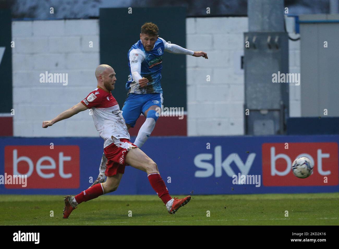 Stevenage's Scott Cuthbert blocks a cross from Barrow's Patrick Brough during the Sky Bet League 2 match between Barrow and Stevenage at the Holker Street, Barrow-in-Furness on Saturday 12th February 2022. (Photo by Mark Fletcher/MI News/NurPhoto) Stock Photo