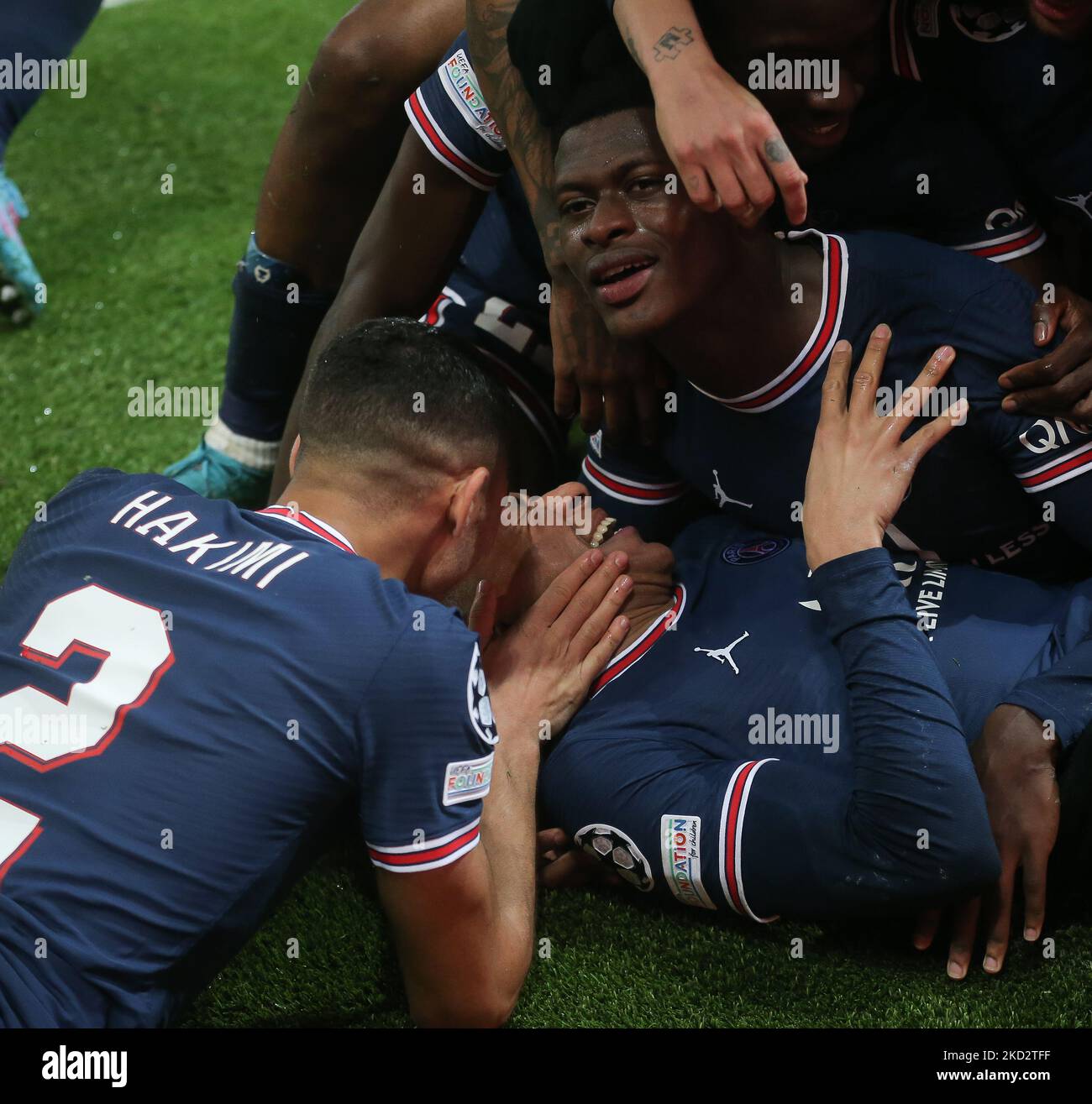 Kylian Mbappe of Paris Saint Germain celebrating his goal with his teammates of Paris Saint Germain during the UEFA Champions League Round Of Sixteen Leg One match between Paris Saint-Germain and Real Madrid at Parc des Princes on February 15, 2022 in Paris, France (Photo by Raddad Jebarah/NurPhoto) Stock Photo