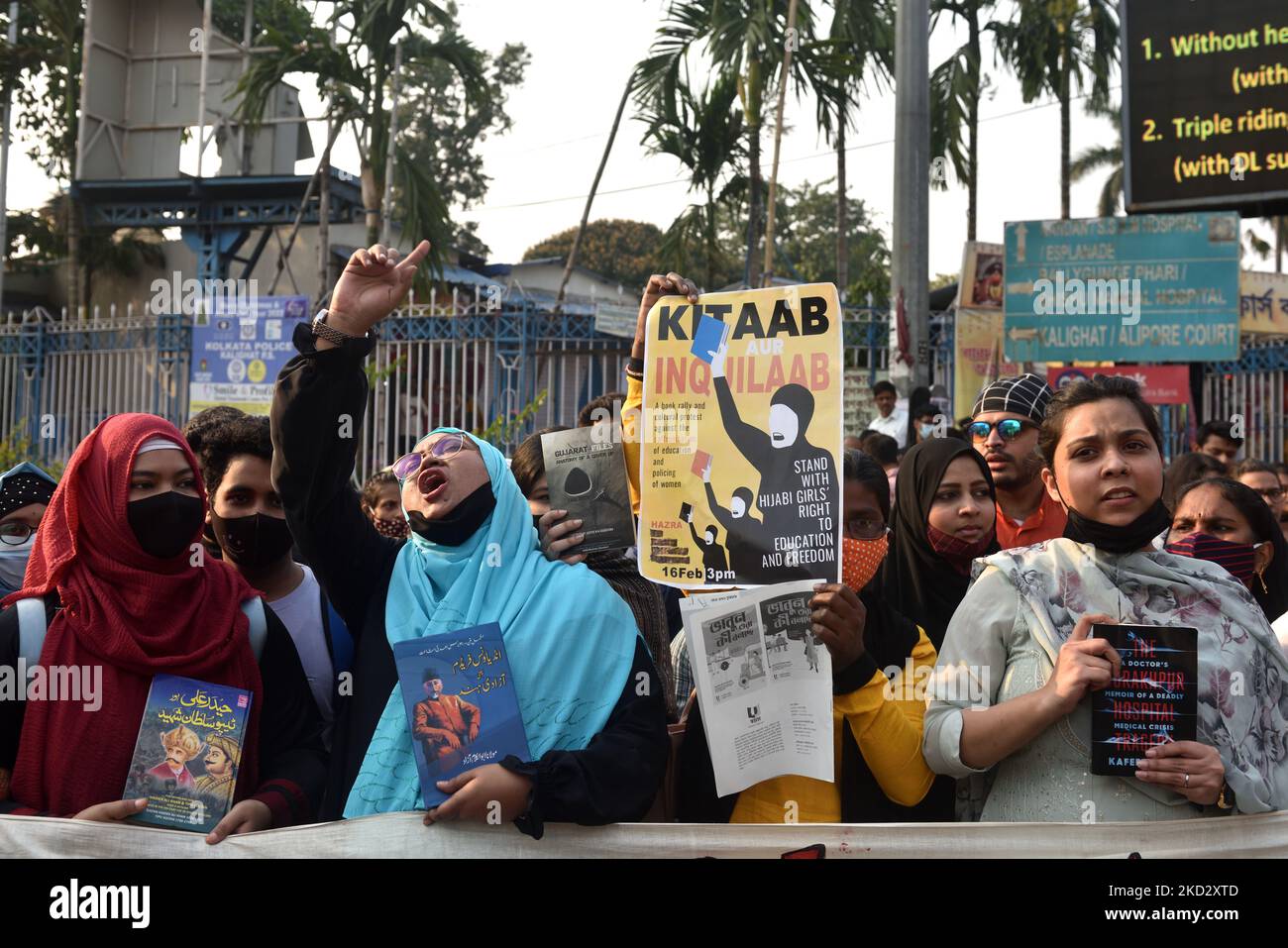 Activists hold placards and march during a demonstration in Kolkata, on 16 February 2022 after students at government-run high schools in India's Karnataka state were told not to wear hijabs to class. (Photo by Sukhomoy Sen/NurPhoto) Stock Photo
