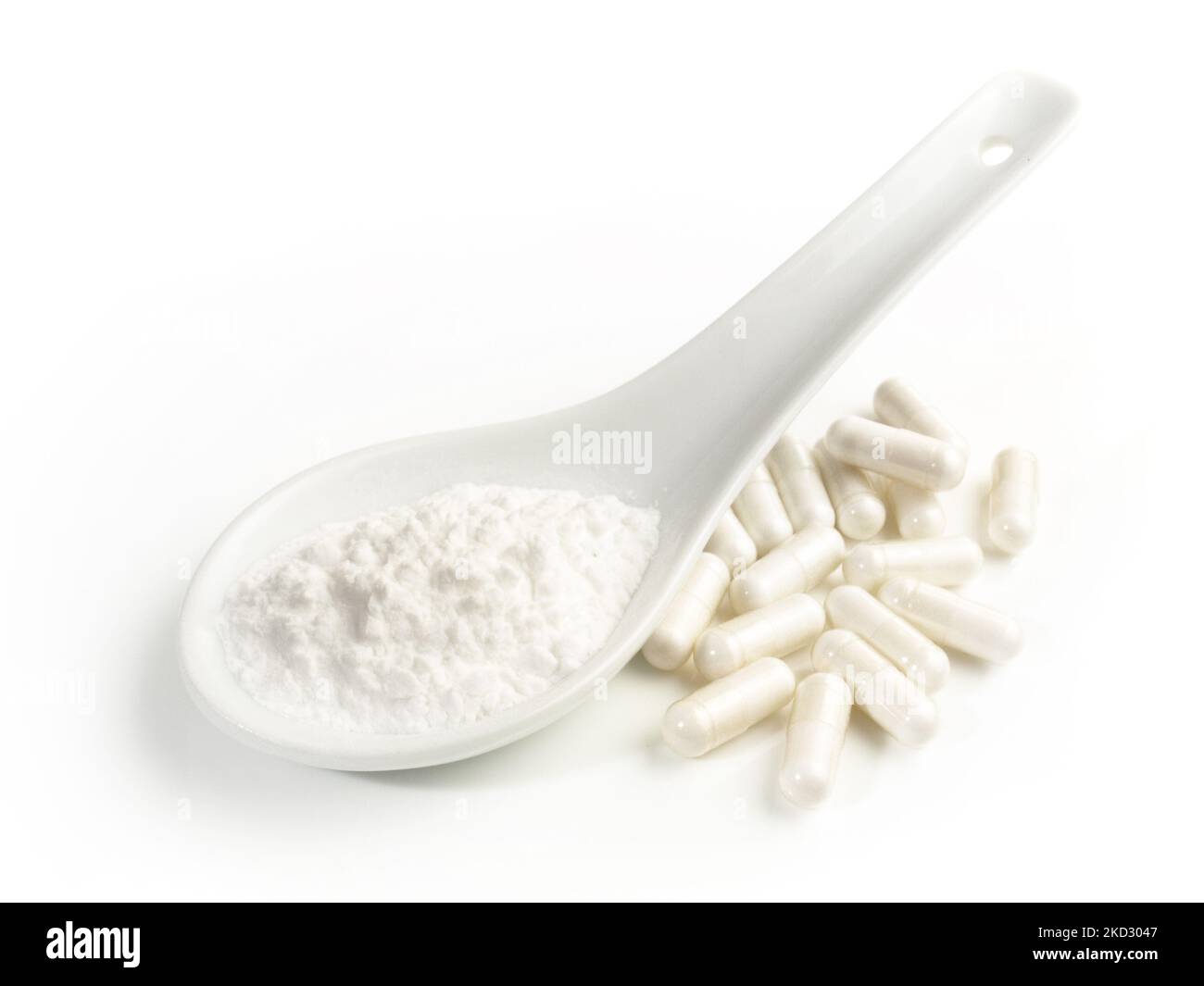 Manganese Powder with Capsules isolated  on white Background - Healthy Nutrition Stock Photo