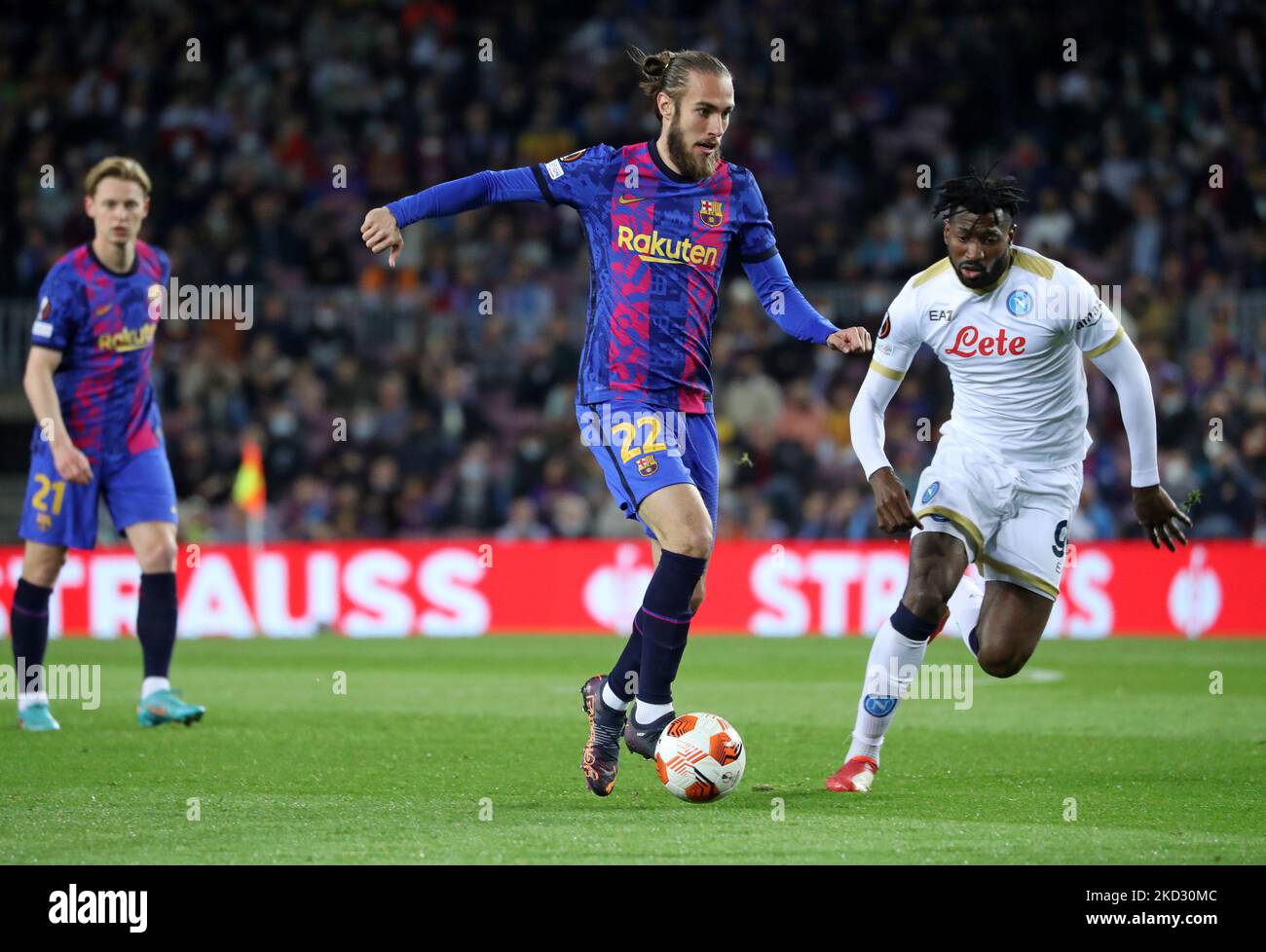Oscar Mingueza and Andre Zambo Anguissa during the match between FC Barcelona and SSC Napoli, corresponding to the first leg of the knock-out play-off, played at the Camp Nou Stadium, in Barcelona, on 17th February 2022. (Photo by Joan Valls/Urbanandsport /NurPhoto) Stock Photo